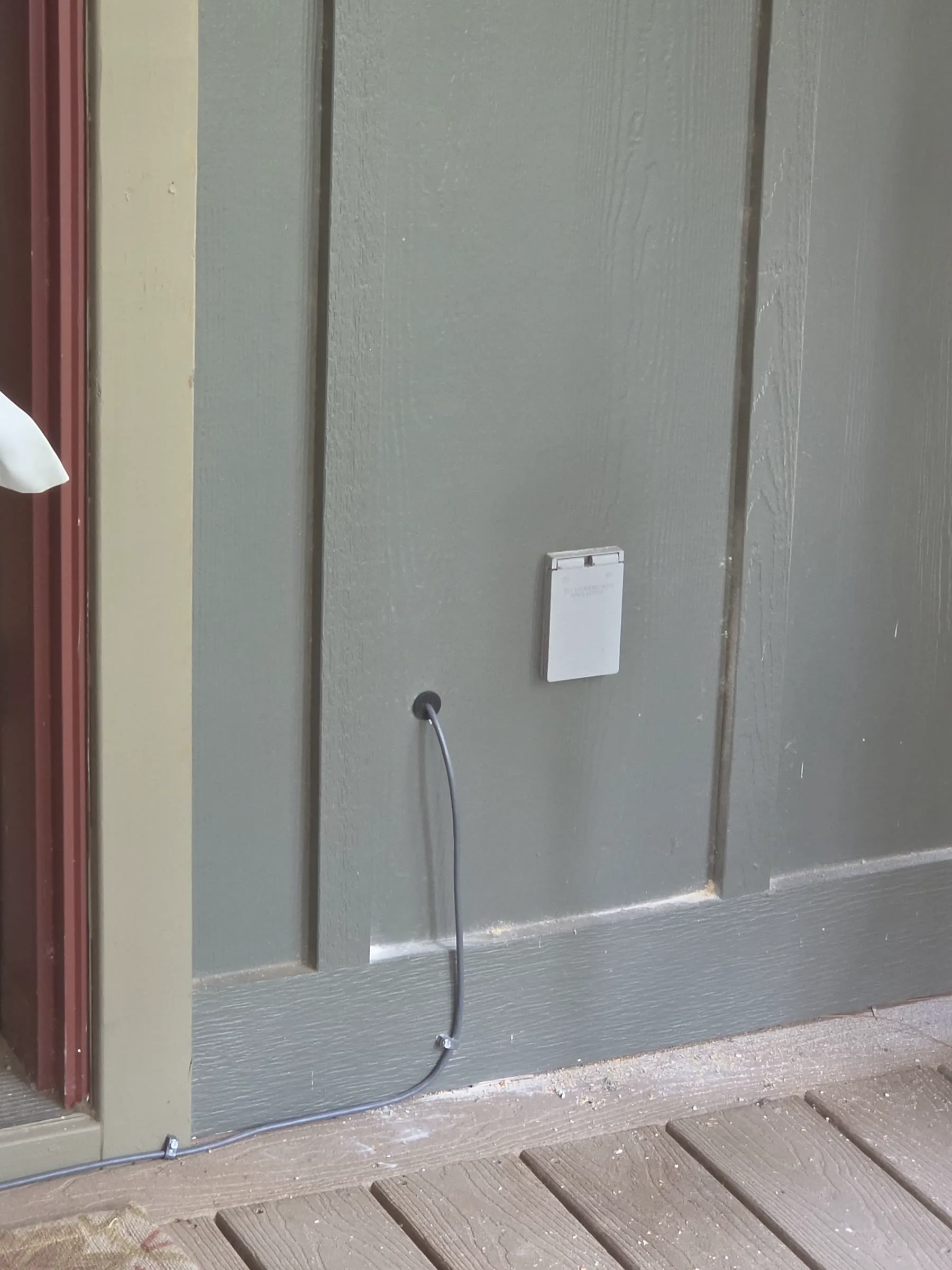 Starlink cable routed through a sealed exterior entry point at a Lake Martin home