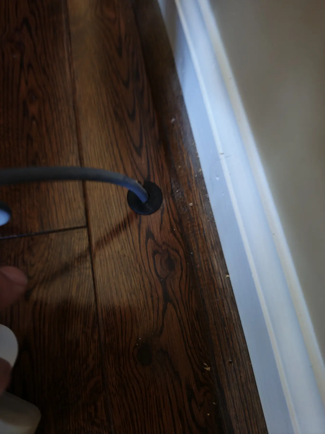 Starlink cable protected by a fitted grommet at an interior entry point
